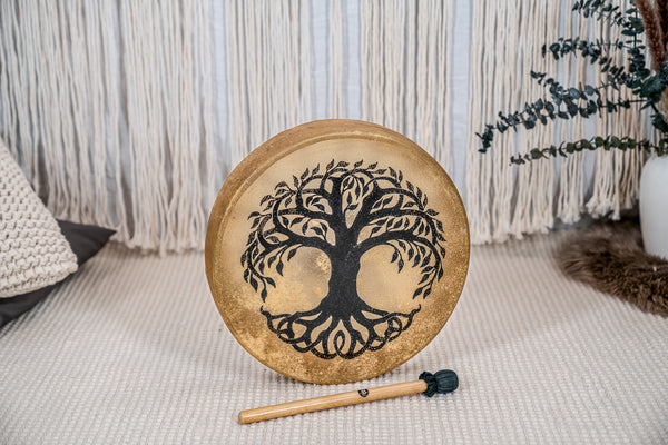 A Meinl 15" Native American-Style Hoop Drum, Tree of Life with a tree of life design on it.