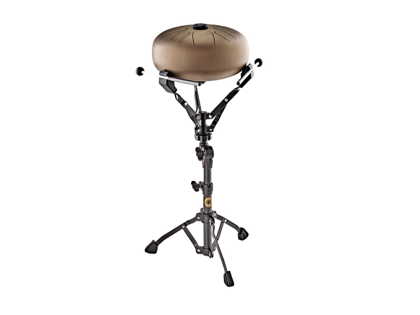 An adjustable height Meinl drum stand with a Small Steel Handpan/Tongue Drum Stand, Black on it.