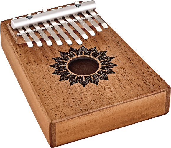 A wooden box with a Meinl 10 notes Kalimba, Mahogany, perfect for sound healing therapy.