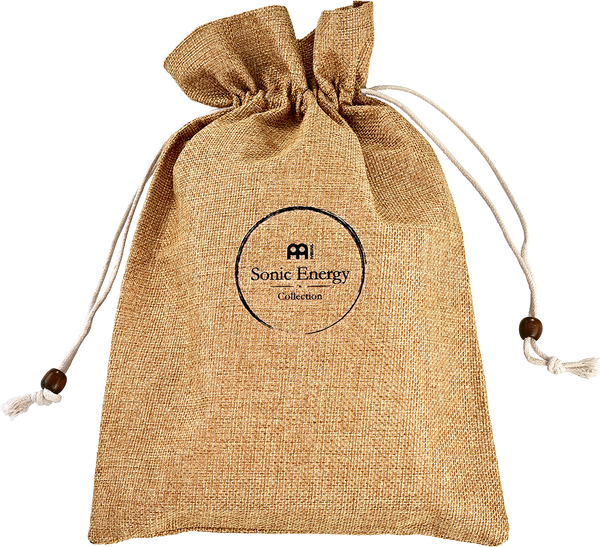 A tan drawstring bag perfect for carrying your Meinl Sonic Energy Soundhole Kalimba or Thumb Piano, ideal for sound healing therapy enthusiasts.
