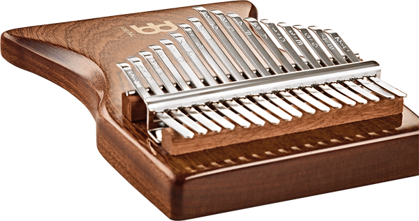 A melodic instrument called a 17 notes Kalimba, Sapele by Meinl on top of a white background.