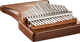 A melodic instrument called a 17 notes Kalimba, Sapele by Meinl on top of a white background.