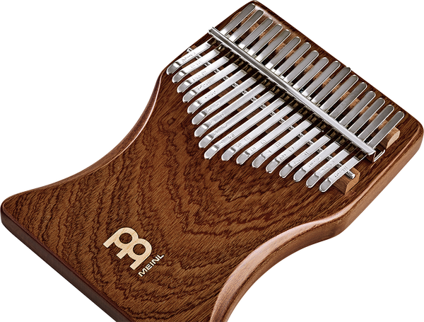 A Meinl 17 notes Kalimba, Sapele, a melodic instrument, on a white background.