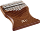 A melodic instrument, a Meinl 17 notes Kalimba made of Sapele wood, on a white background.