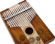 The Meinl 17 notes Kalimba, Maple & Acacia is a melodic instrument made of wood and adorned with beautiful sunflowers. Its delicate craftsmanship and the inclusion of the C Major scale make for a captivating musical experience.