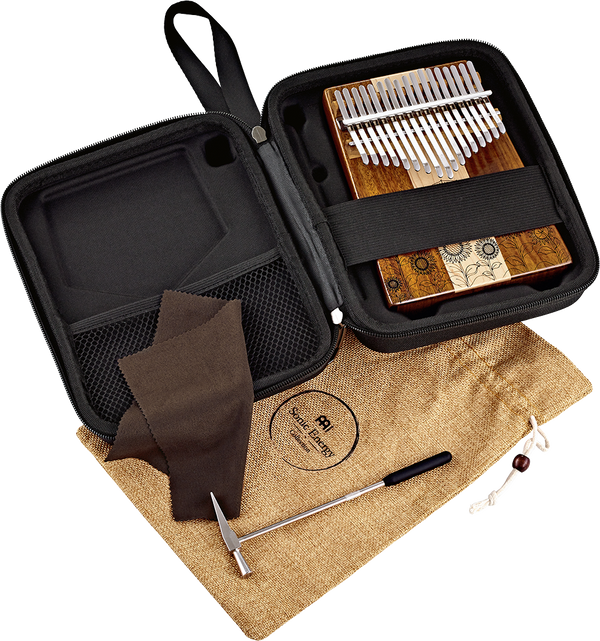 A bag containing a Meinl 17 notes Kalimba, Maple & Acacia, a melodic instrument in C Major scale, and other items.