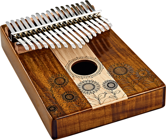 A Meinl 17 notes Kalimba, Maple & Acacia with a flower design on it, perfect for melodic instrument enthusiasts.