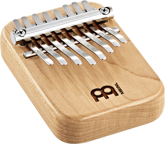 A Meinl 8 notes Kalimba, Maple, also known as a melodic instrument, on top of a white background.