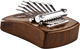 An 8 notes Kalimba, Tree Of Life, Black Walnut by Meinl, a wooden musical instrument with a set of six keys, is popular among musicians for sound healing therapy.