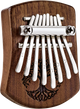A Meinl 8 notes Kalimba, Tree Of Life, Black Walnut, perfect for musicians and sound healing therapy enthusiasts looking to explore the soothing tones of kalimba music.