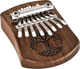 A Meinl 8 notes Kalimba, Tree Of Life, Black Walnut, perfect for musicians exploring sound healing therapy.