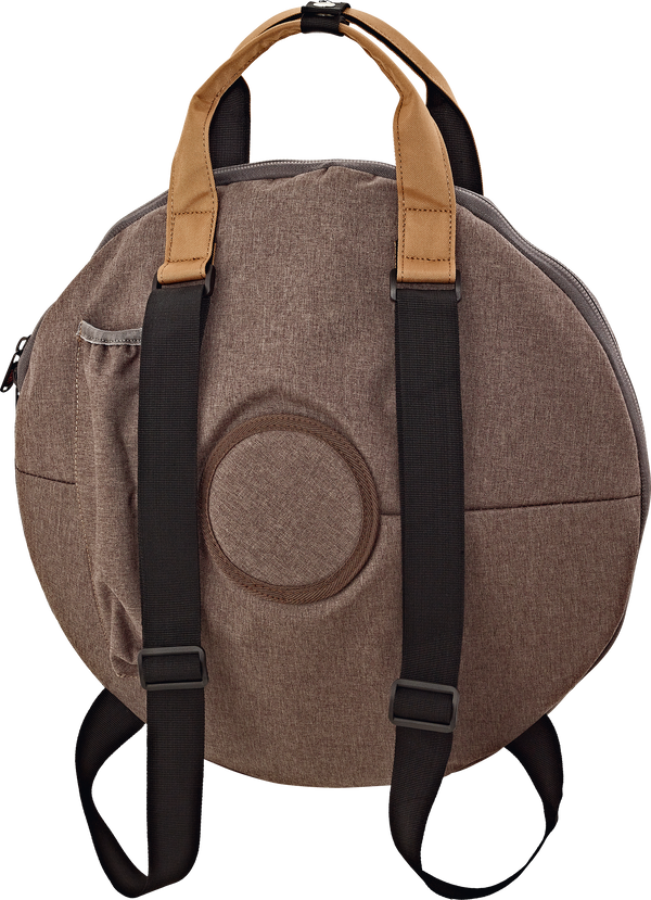 A high-quality Meinl brown and tan backpack with straps.