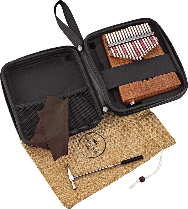 A bag with a Meinl 17 notes Kalimba, Mahogany instrument in it.