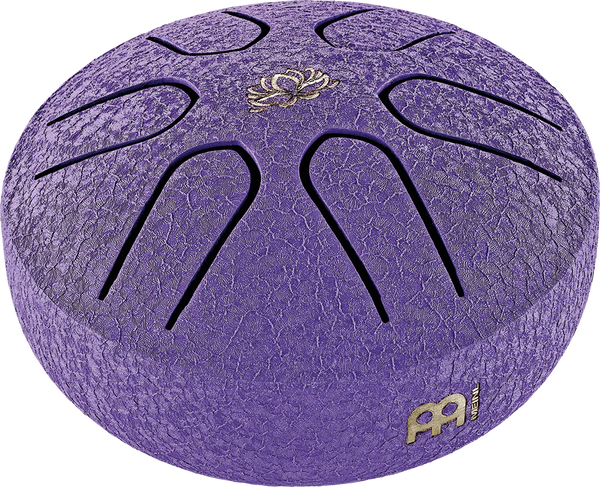 A Meinl 3" Tongue Drum, A Major, Lotus Flower, Purple, compact in size, featuring a purple ball with a gold logo on it.