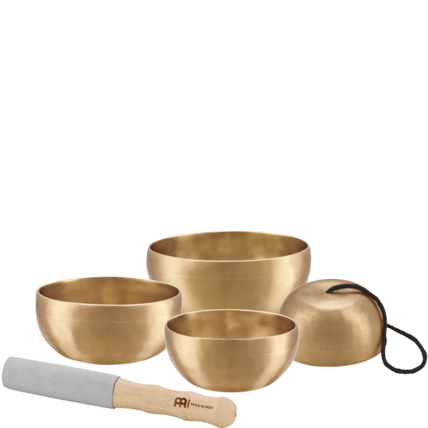 A collection of Meinl Universal Series Singing Bowls, made of brass, designed for meditation and played with a wooden stick.