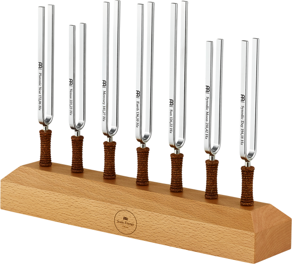 A Meinl wooden holder with five metal rods on it, ideal for holding a 7-piece Tuning Fork Chakra Set Incl. Holder to enhance their therapeutic effect.